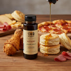 Buzzberry Farms Jalapeno-Infused Hot Honey with biscuits, pizza, fried chicken, cheese, and charcuterie