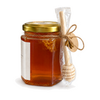 Buzzberry Farms Local Wildflower Honey with Cut Comb, 8 oz glass jar — side view showing cut comb and wooden honey dipper